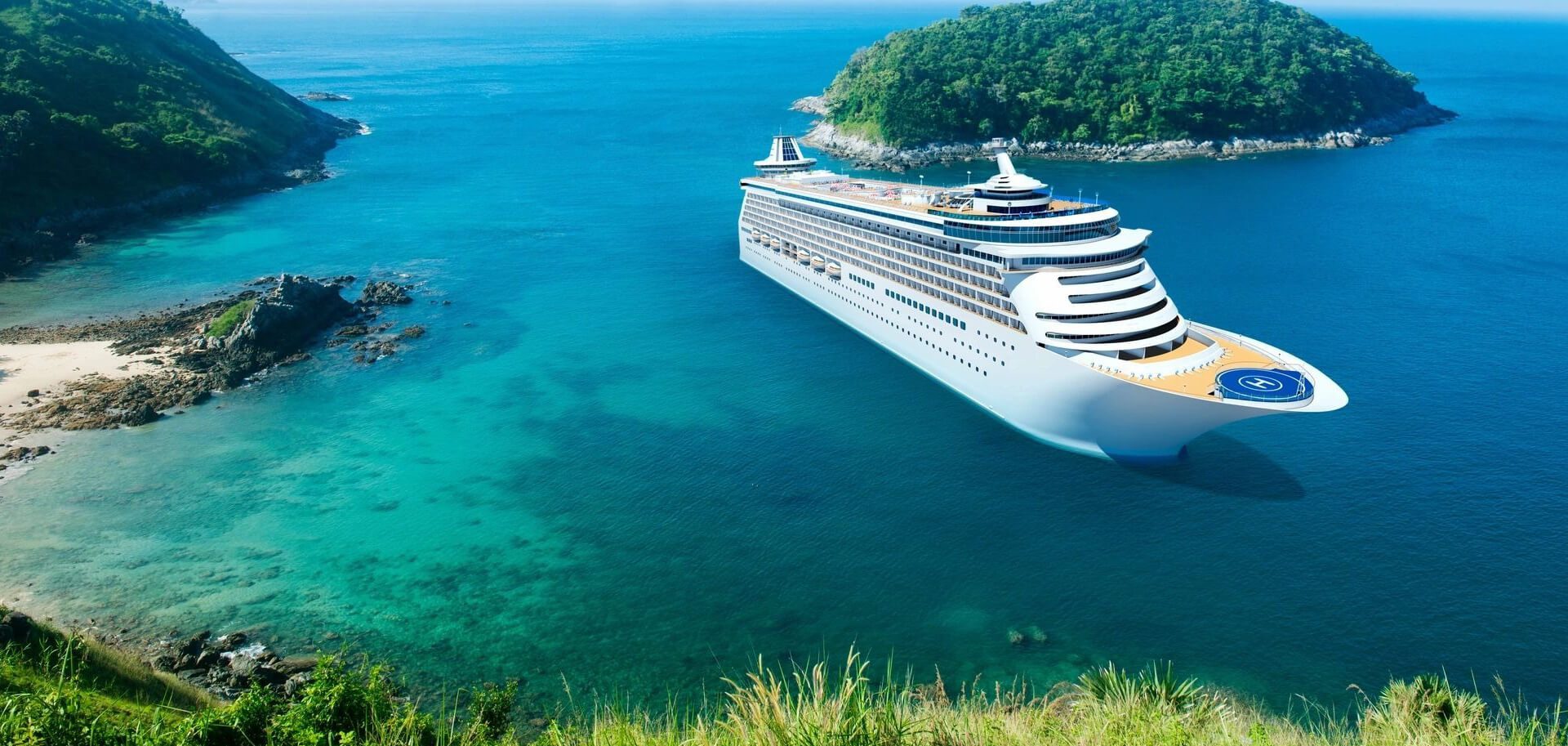 A large cruise ship is in the ocean.